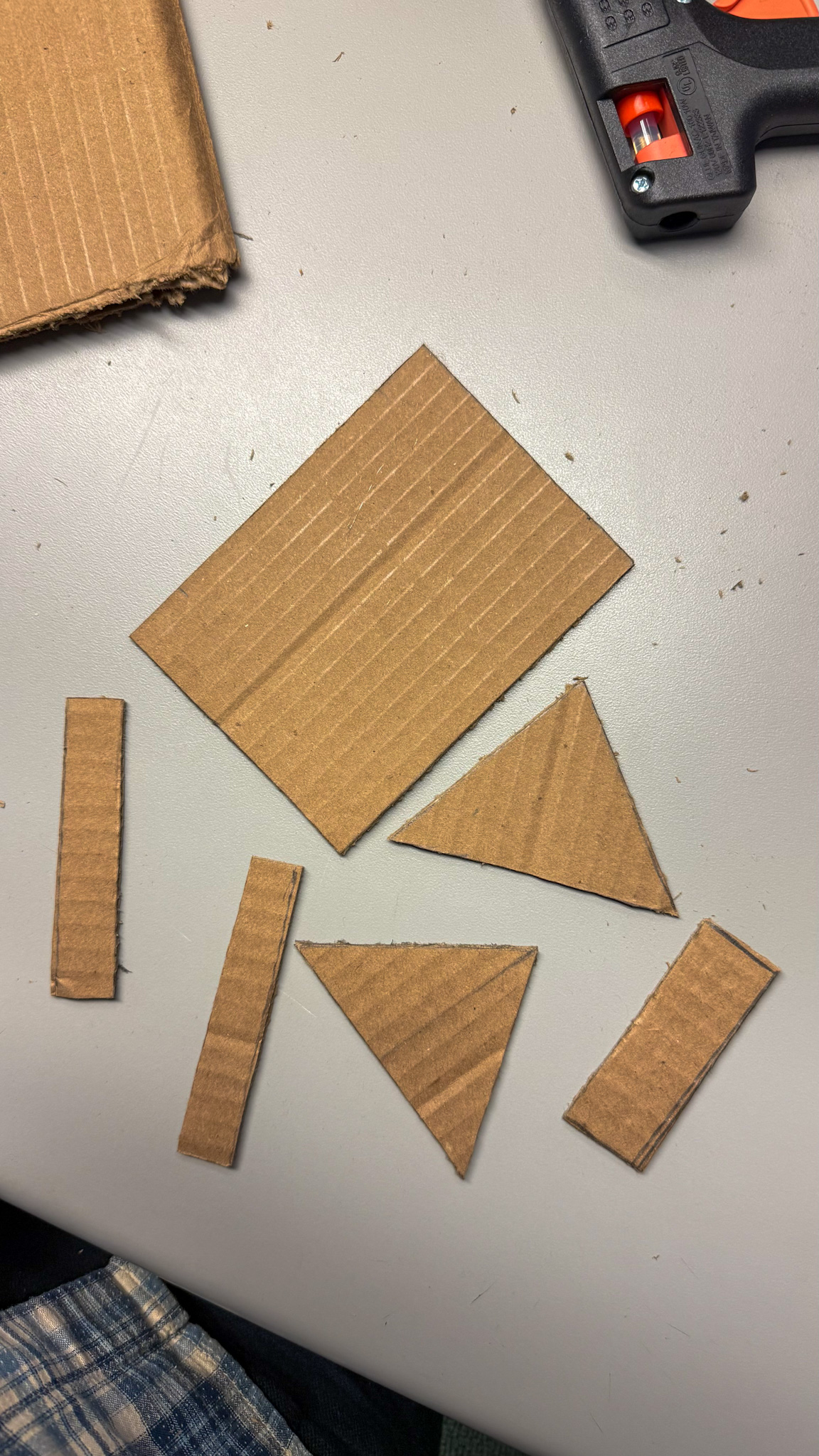 For my second prototype, I recut all the cardboard pieces with more precise measurements. I focused on creating cleaner edges and consistent angles to improve balance and alignment.