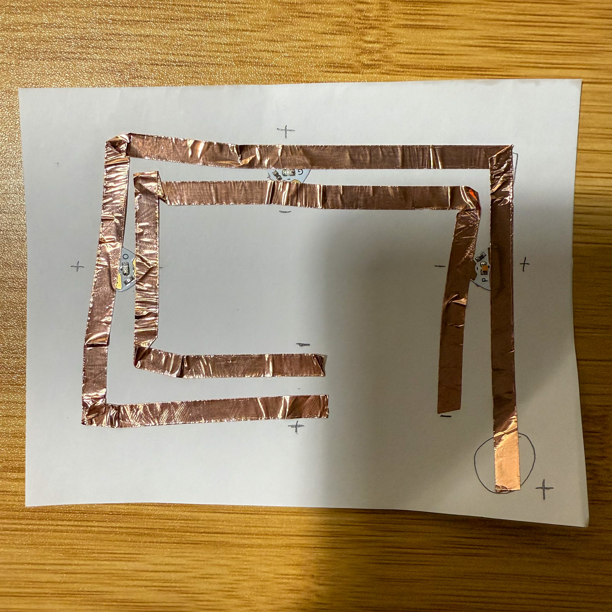 Placing the conductive materials on the circuit. For this circuit, I used conductive tapes.